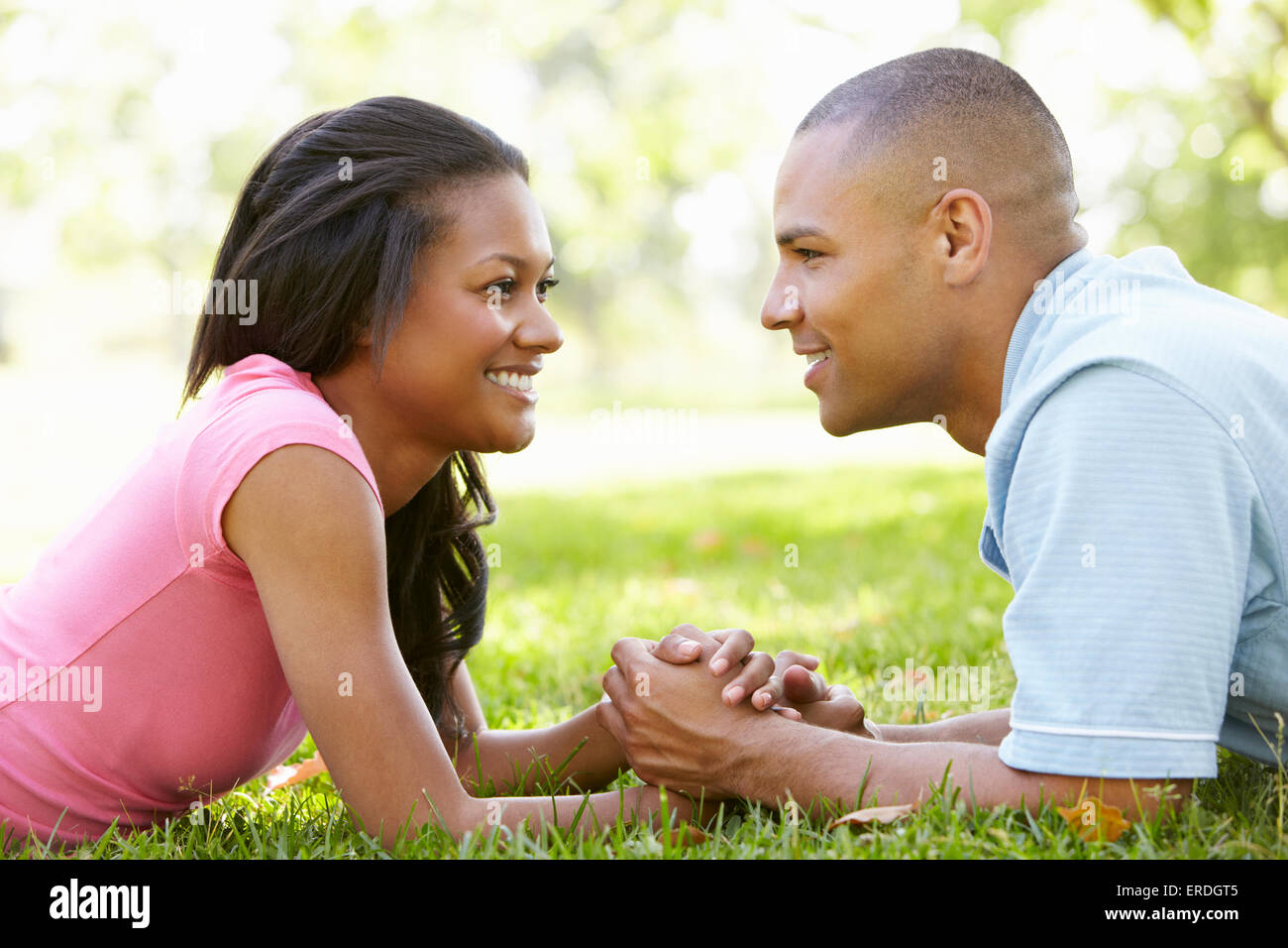 Portrait Of Romantic Young African American Couple In Park Stock Photo ...