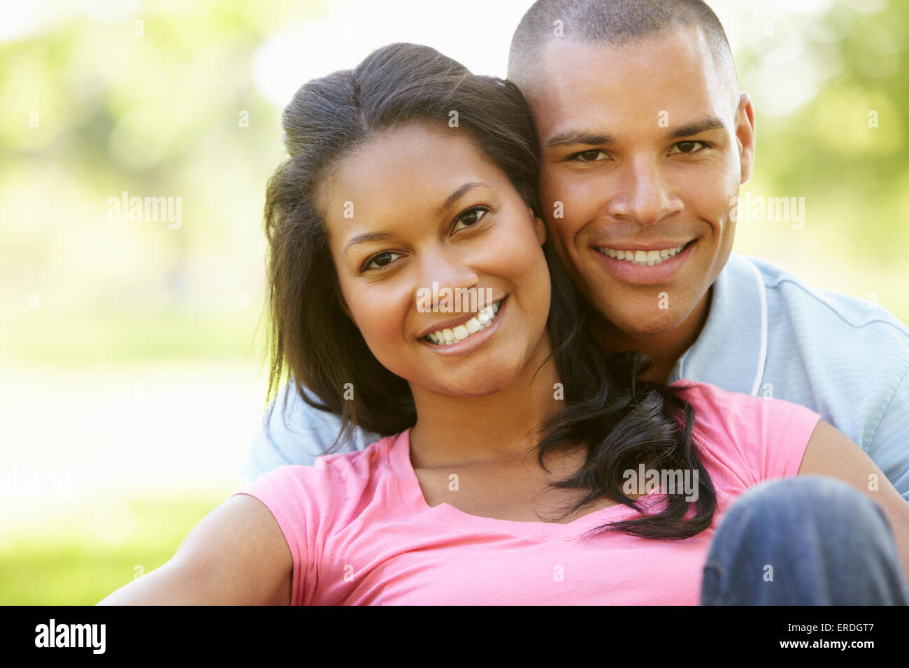 Portrait Of Romantic Young African American Couple In Park Stock Photo ...
