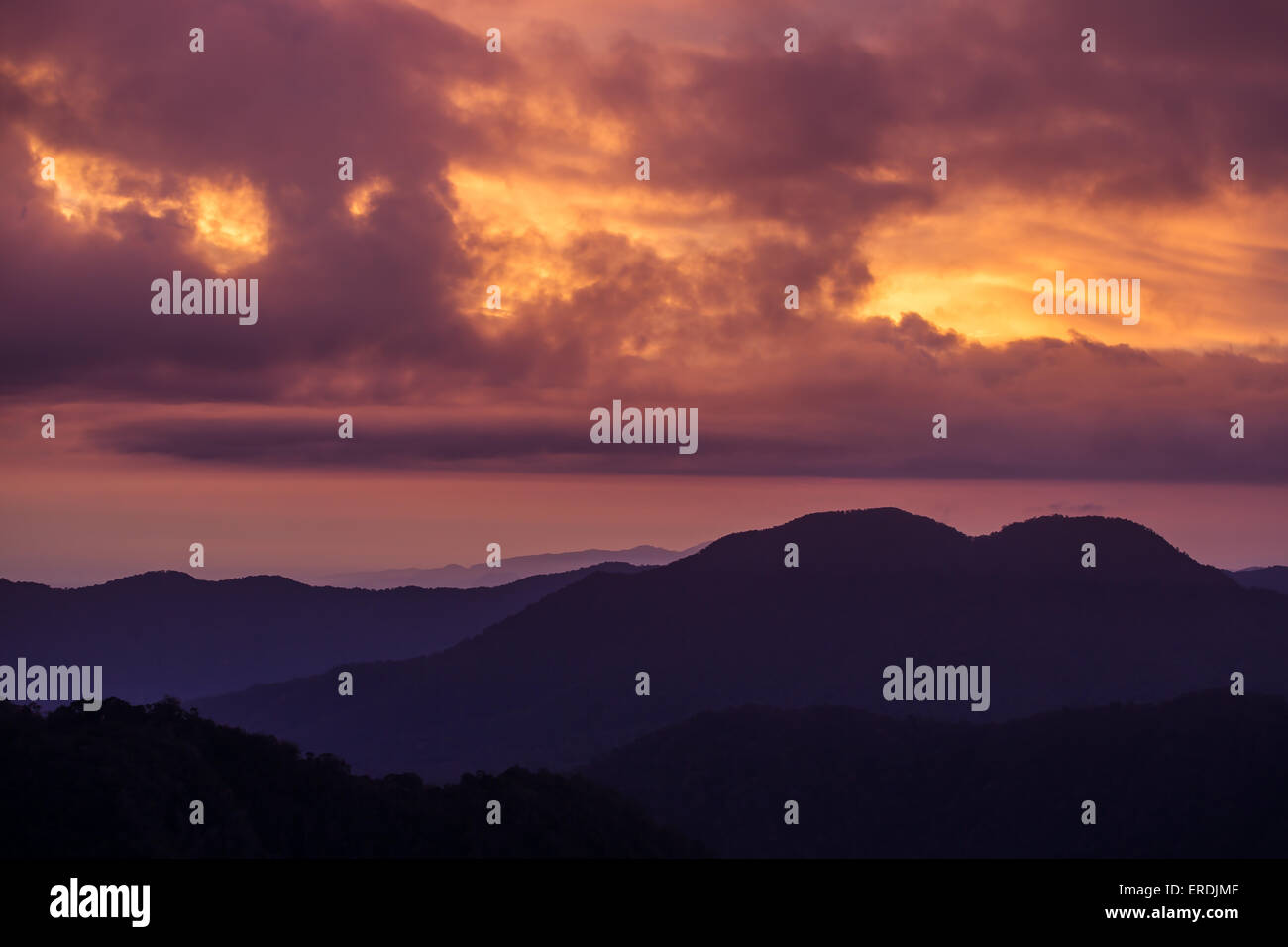 Red sunset sky with dramatic clouds Stock Photo - Alamy