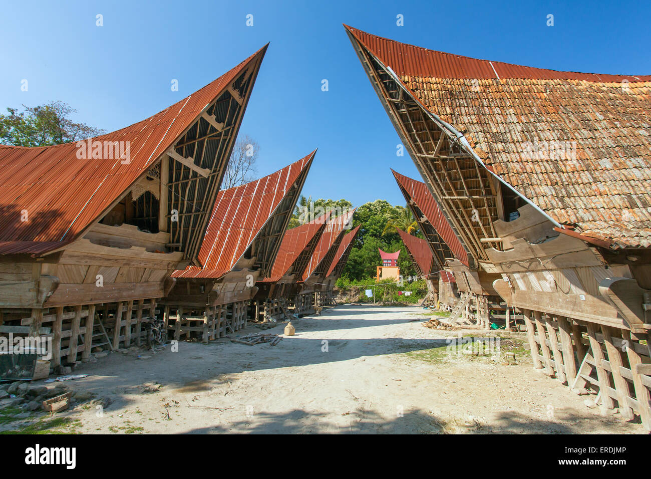 Batak houses on the Samosir island, lake Toba, Indonesia, North Sumatra, Stock Photo