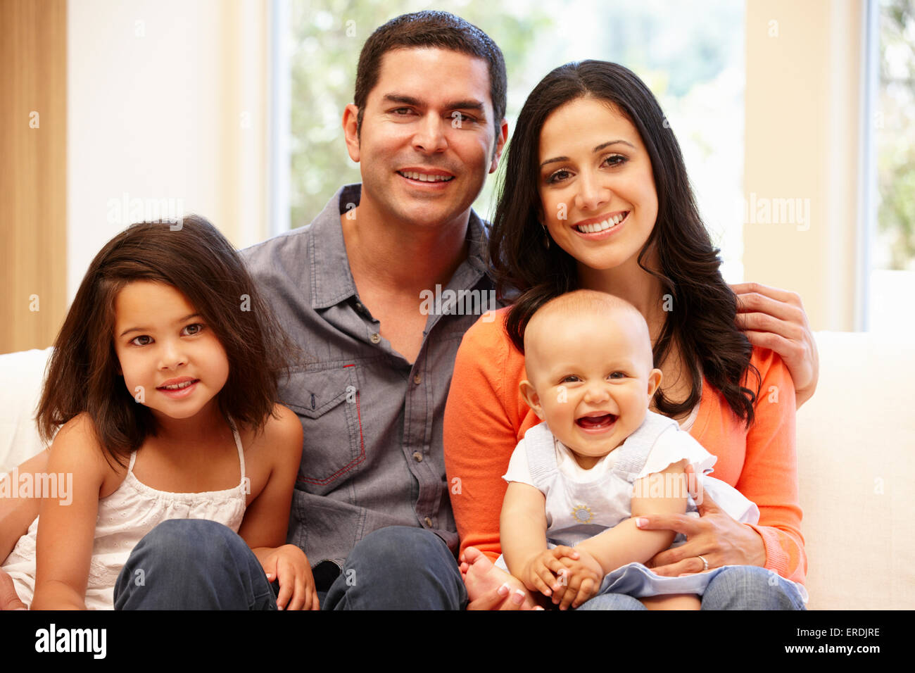 Hispanic family at home Stock Photo