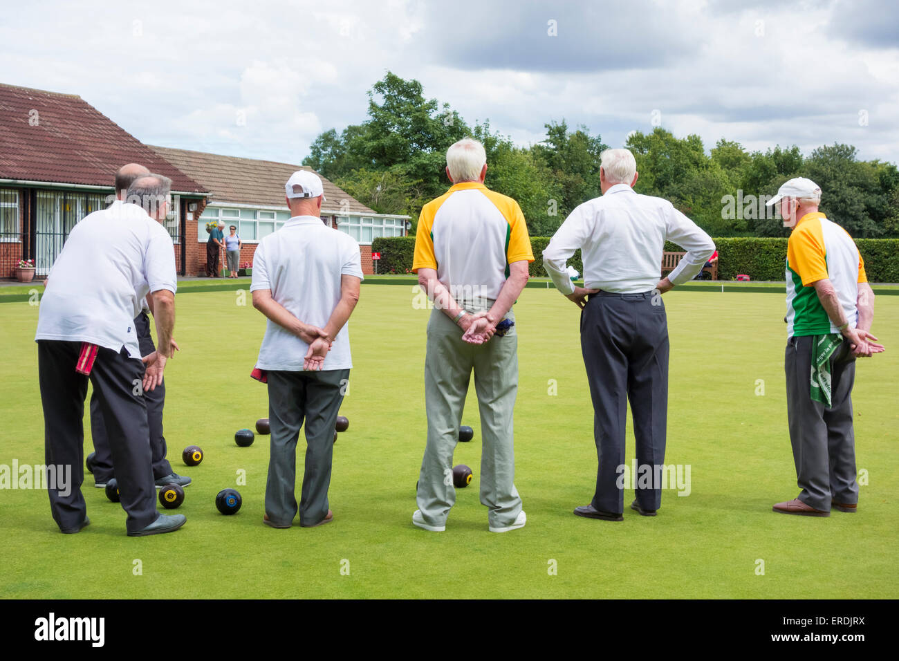 Elderly men playing bowls in park in north east England. UK Stock Photo