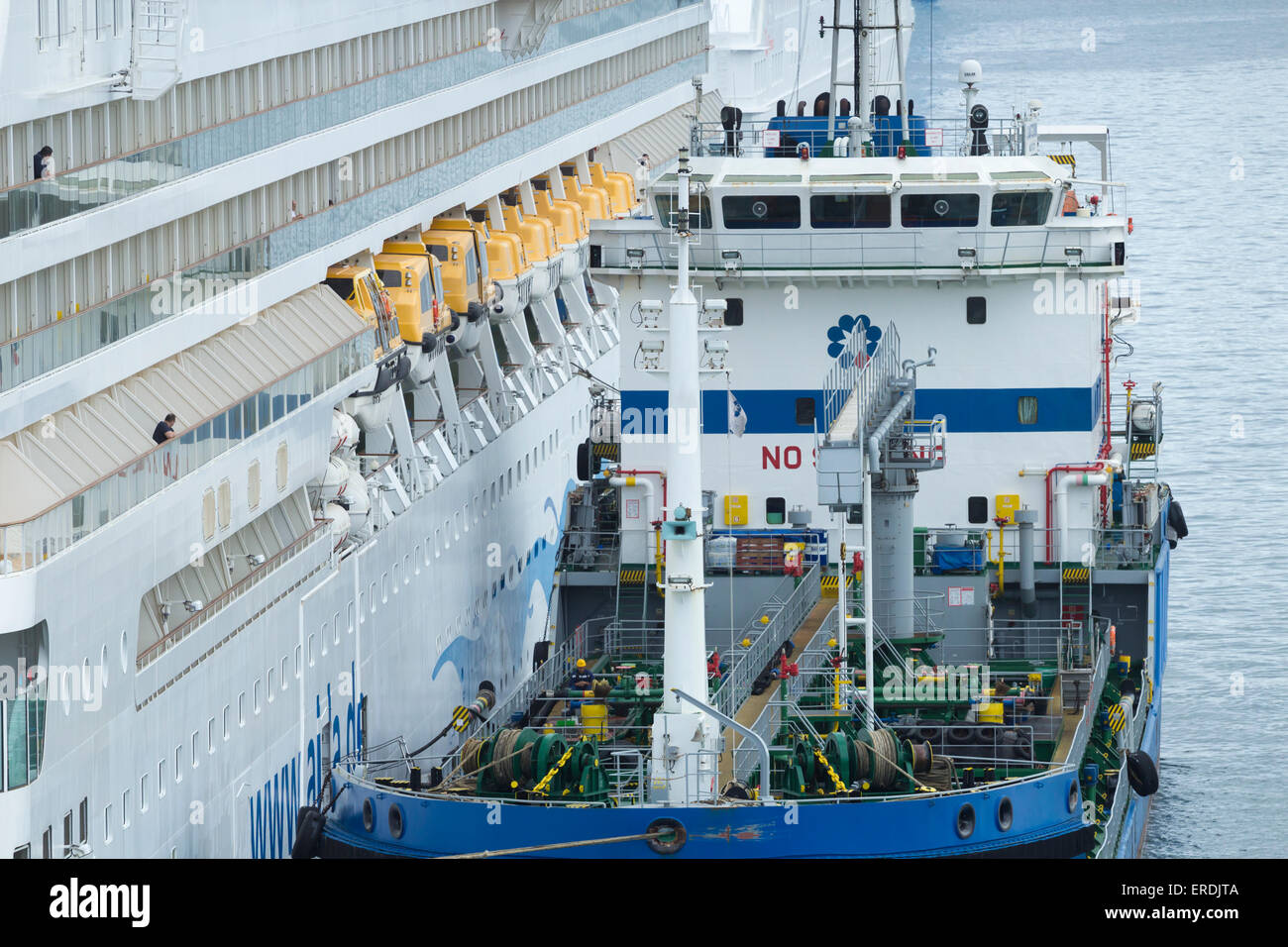 Cruise ship refuelling in port Stock Photo