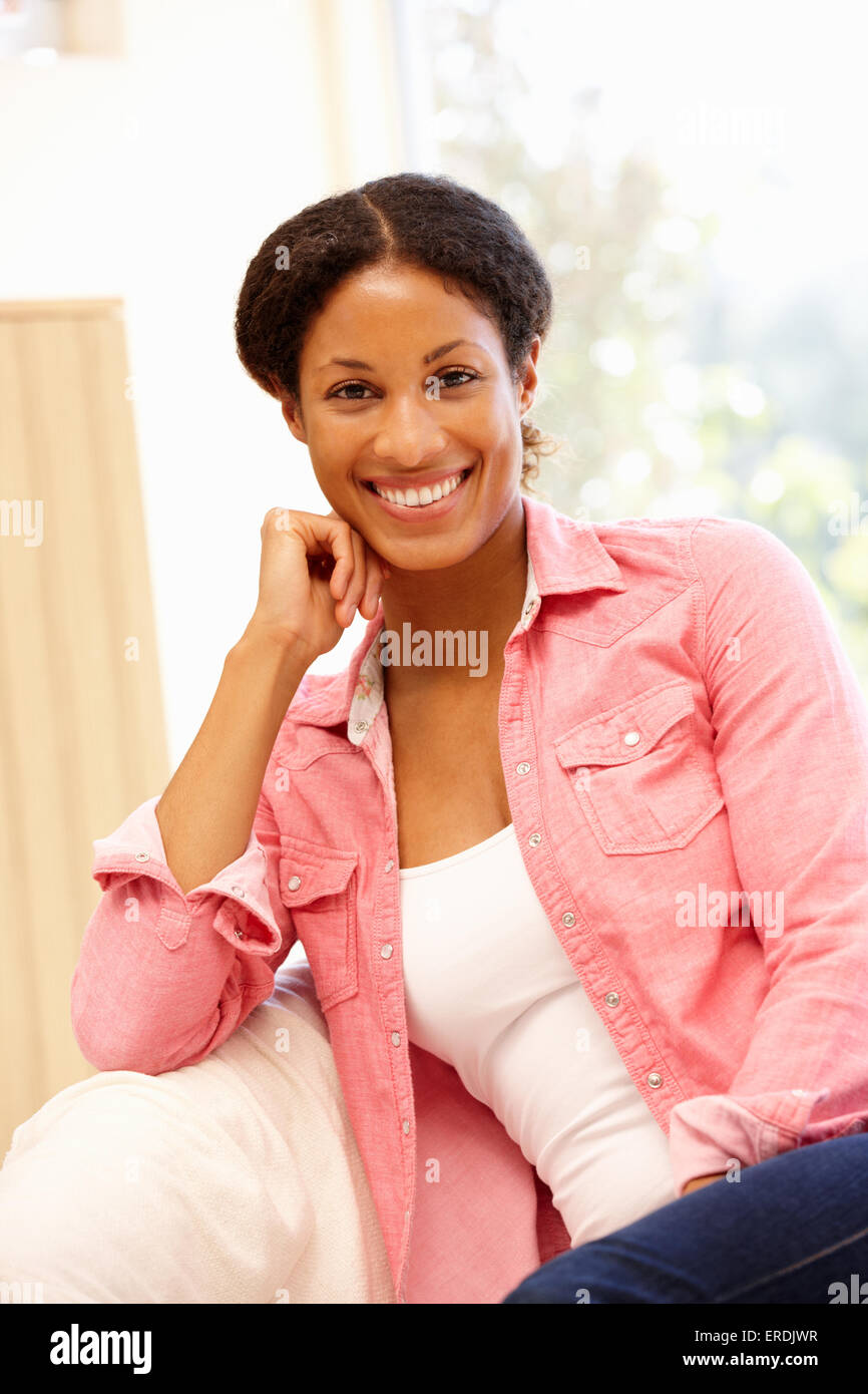 Mixed race woman at home Stock Photo