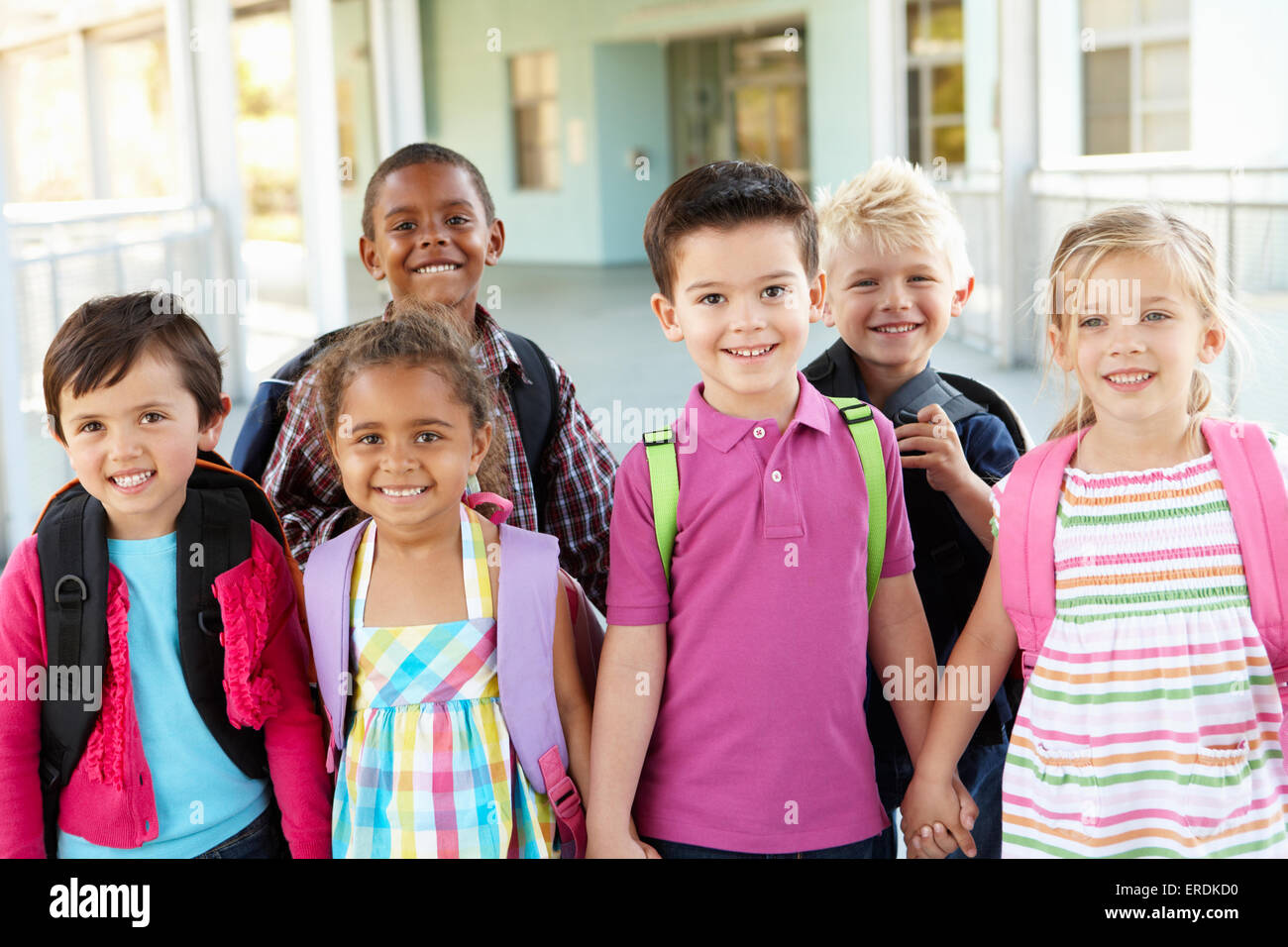 Group Of Elementary Age Schoolchildren Standing Outside Stock Photo - Alamy