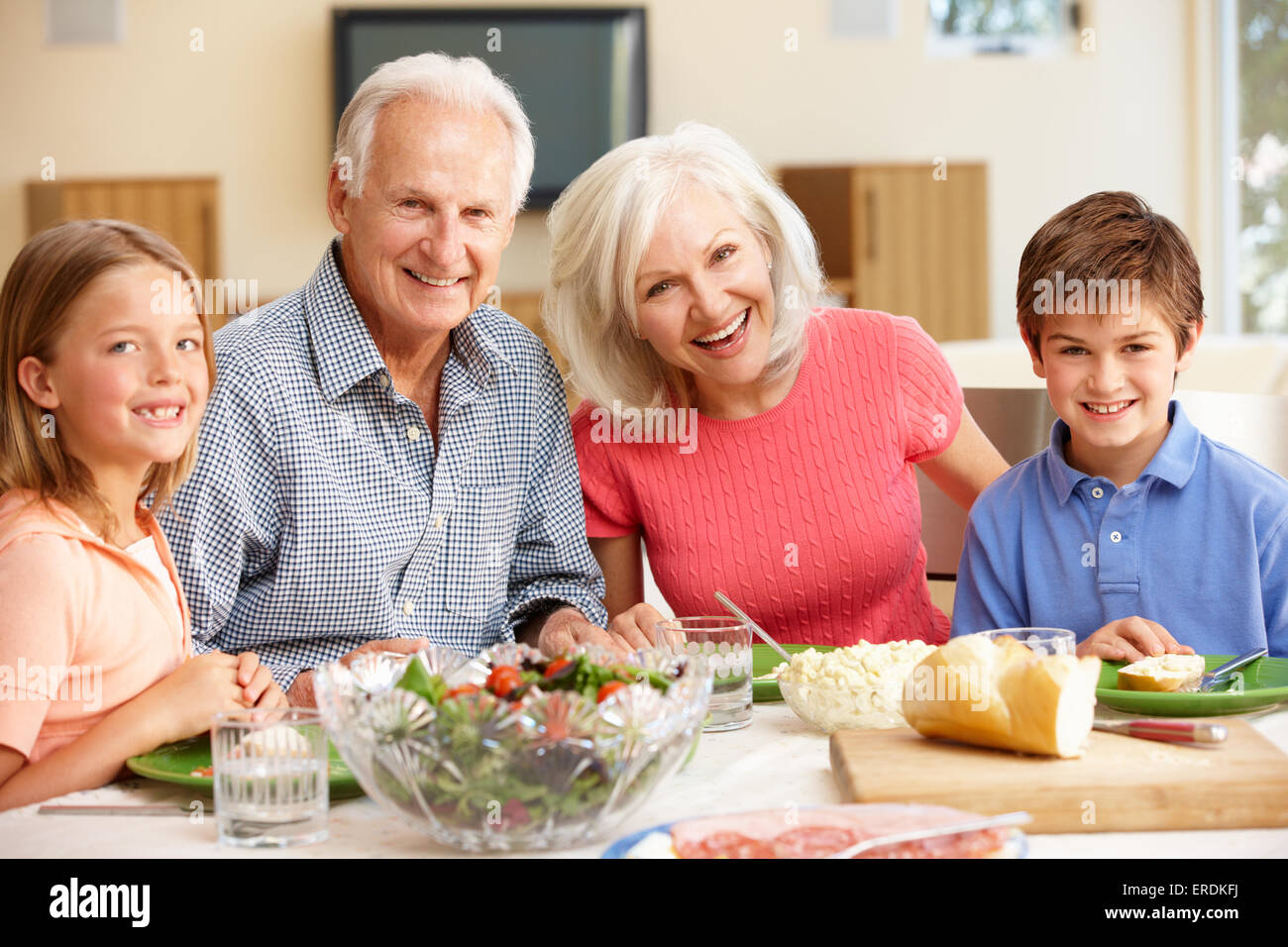 Family sharing meal Stock Photo - Alamy