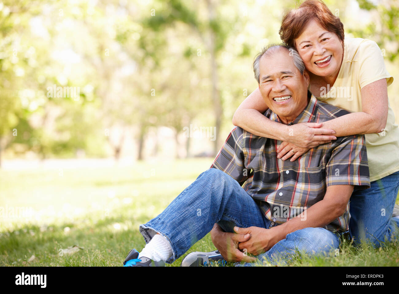 Portrait senior Asian couple in park Stock Photo - Alamy