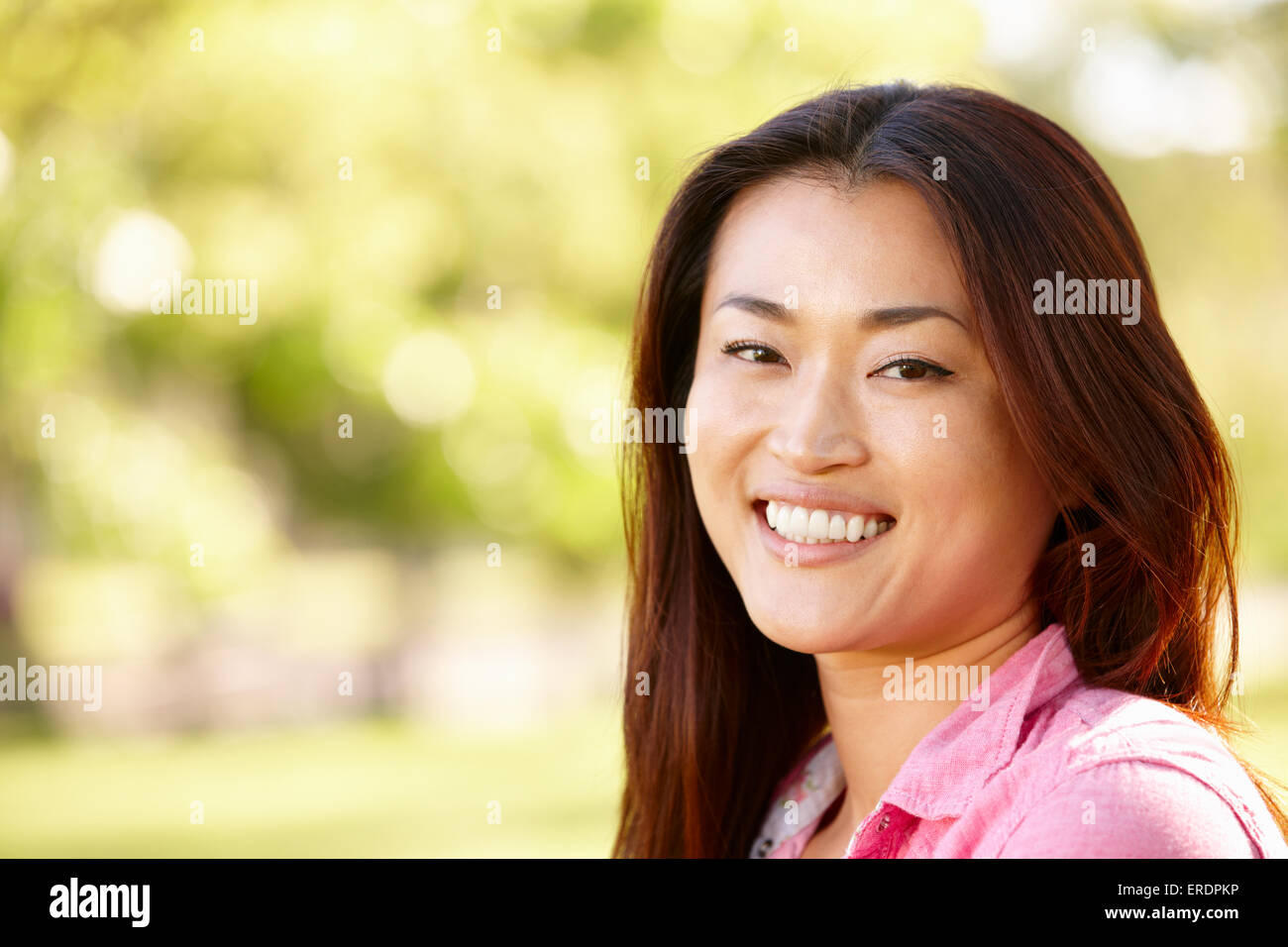 Head and shoulders portrait Asian woman outdoors Stock Photo - Alamy