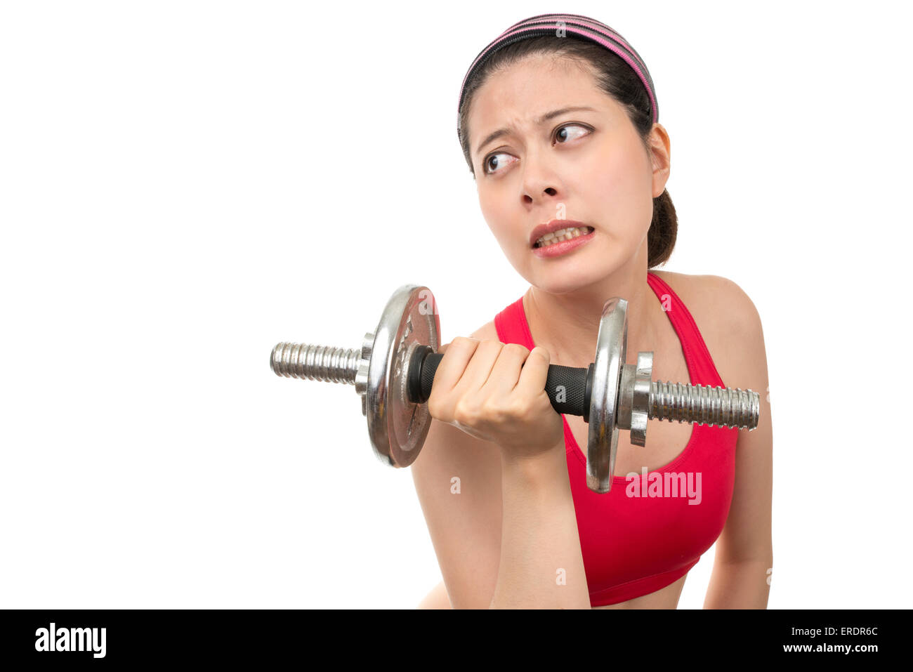 Woman with too heavy dumbbells Stock Photo Alamy