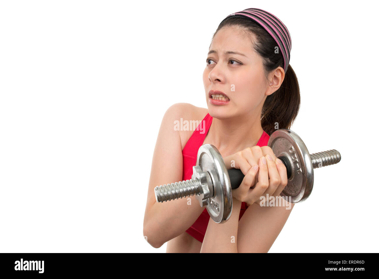 Woman with too heavy dumbbells Stock Photo Alamy