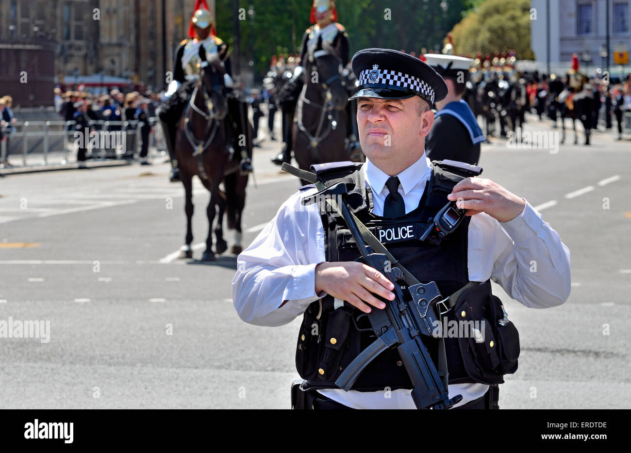 London, England, UK. Armed police officer at the State Opening of Parliament, Westminster, May 27th 2015. Stock Photo