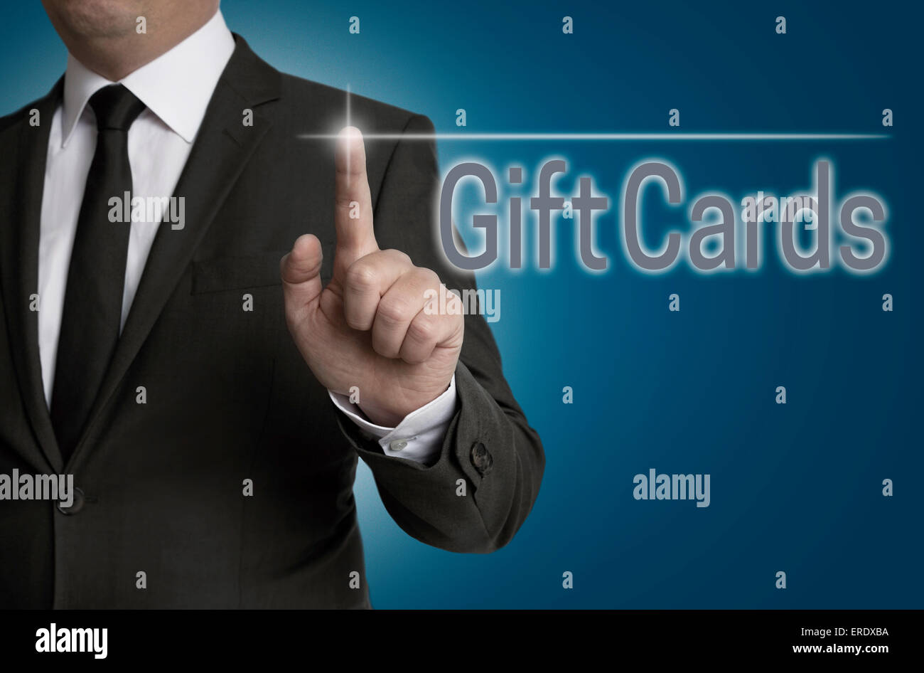 giftcard touchscreen is operated by businessman. Stock Photo