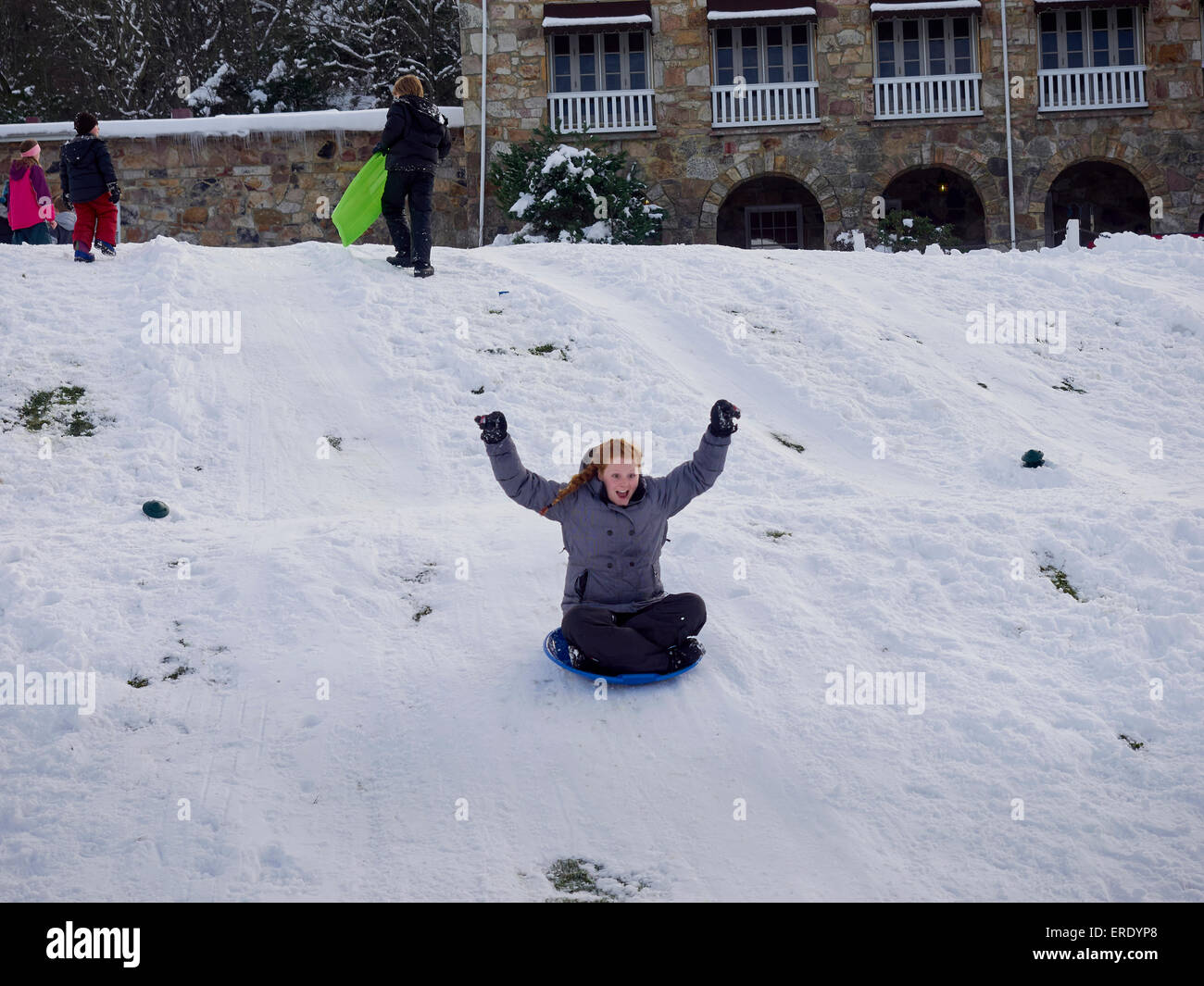 Girl sitting on high hill hi-res stock photography and images - Alamy
