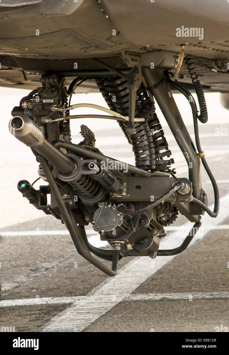 Automatic chain gun attached under the fuselage of a modern attack helicopter Stock Photo
