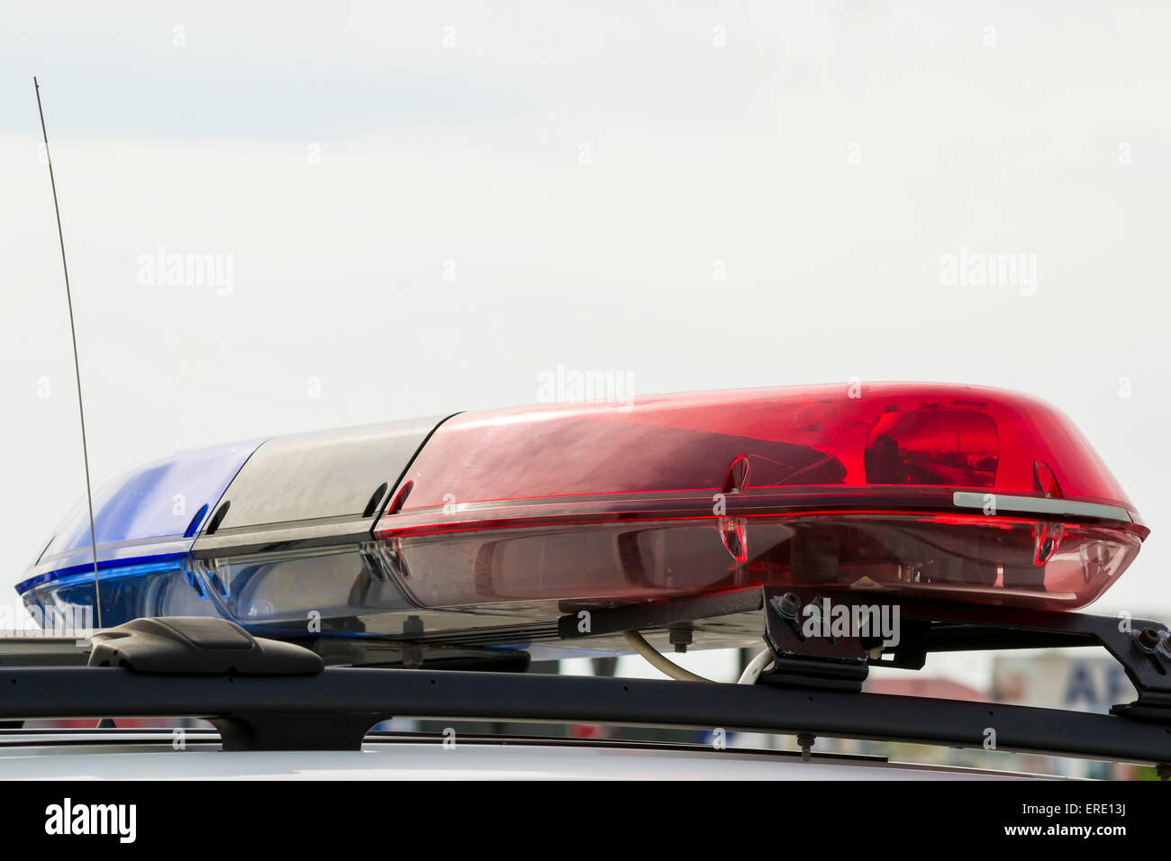 Roof mounted police light bar with typical warning red and blue lights Stock Photo
