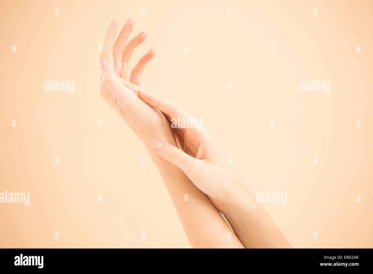 Close up of hands of woman rubbing Stock Photo