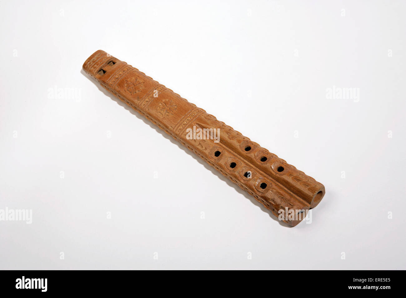 Frula, Slav double flute. Also know as Dvojnica or Dvoynice. Carved from a single piece of wood, one pipe is the drone pipe. Stock Photo