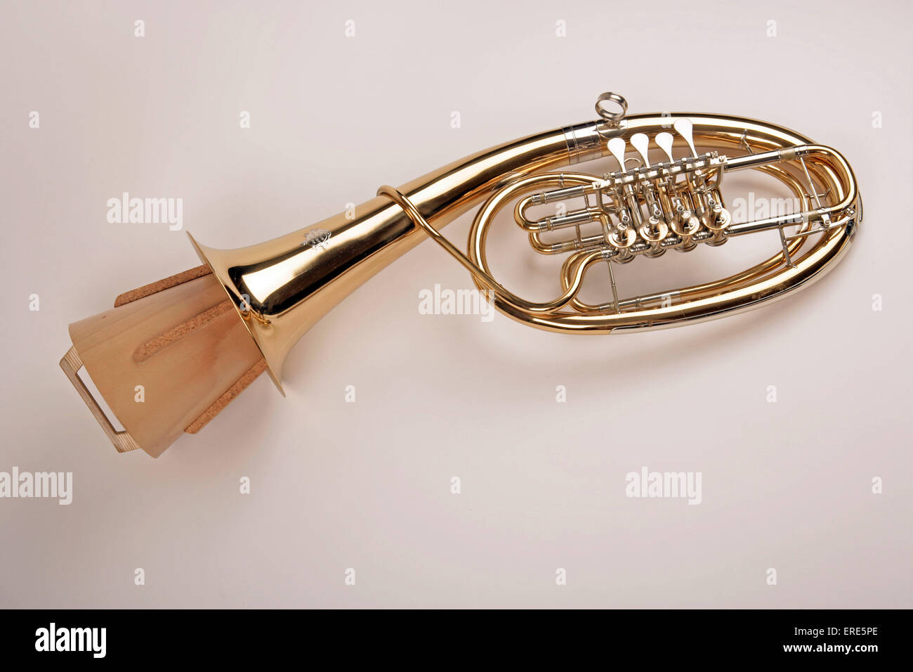 Wagner tuba with a mute in place. Brass instrument developed by Wagner for his Ring cycle. Waldhorntuba. Ringtuba Stock Photo