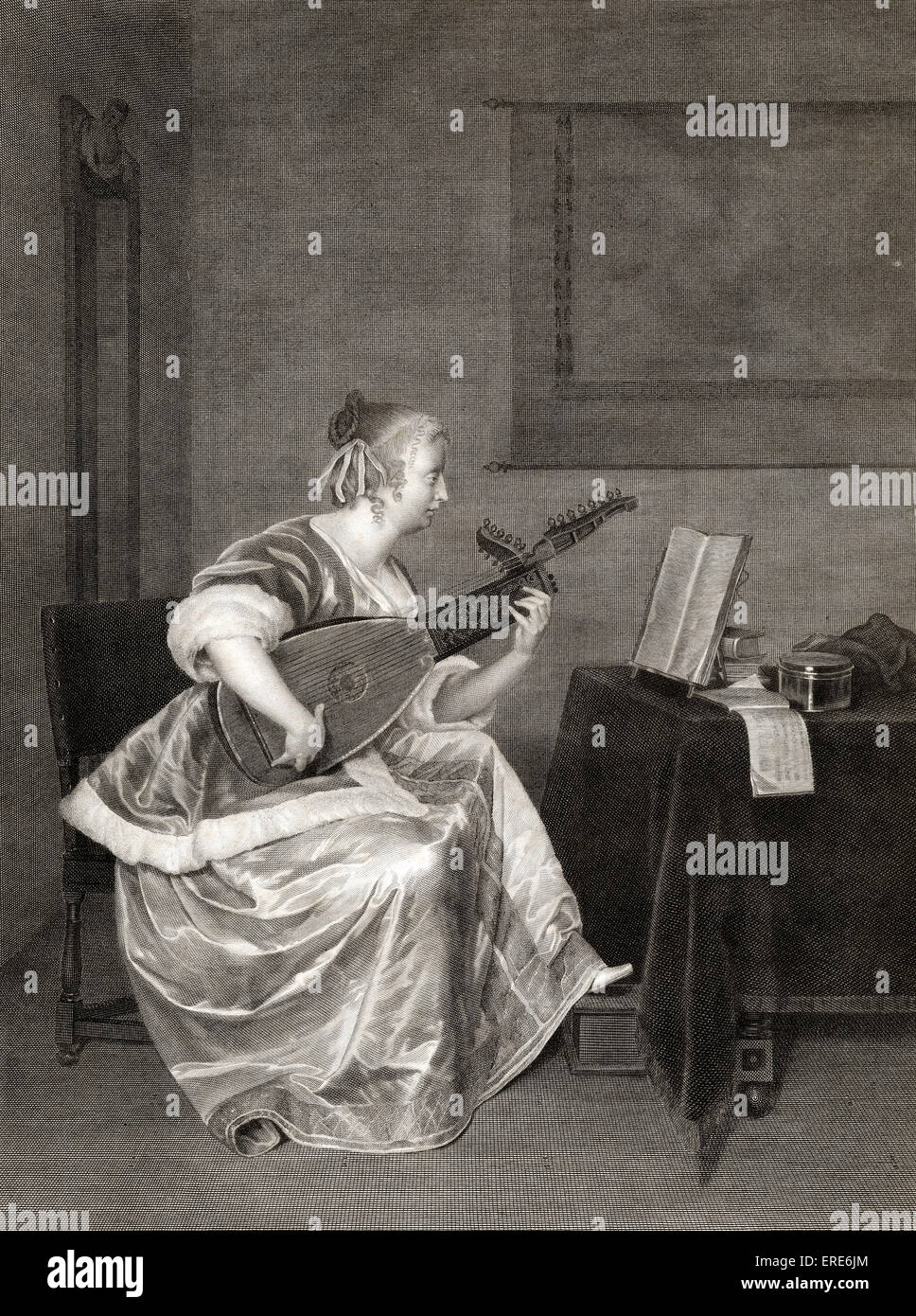 Une jeune femme étudiant sur la mandoline. 'Mandolin student'.  After painting  by Gérard Terburg (ter Borch) engraving by Stock Photo