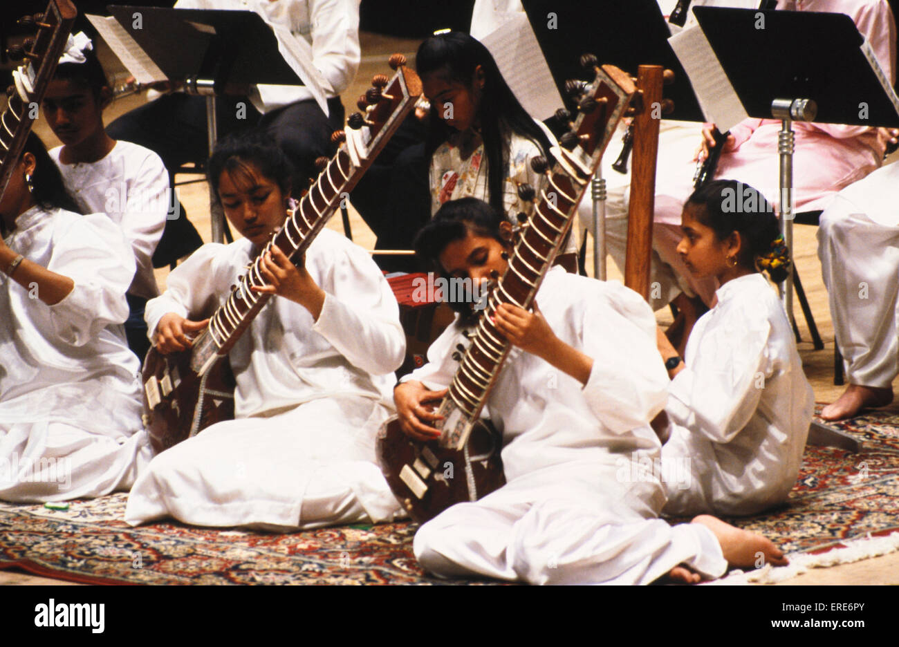 Indian girls playing sitar Stock Photo Alamy