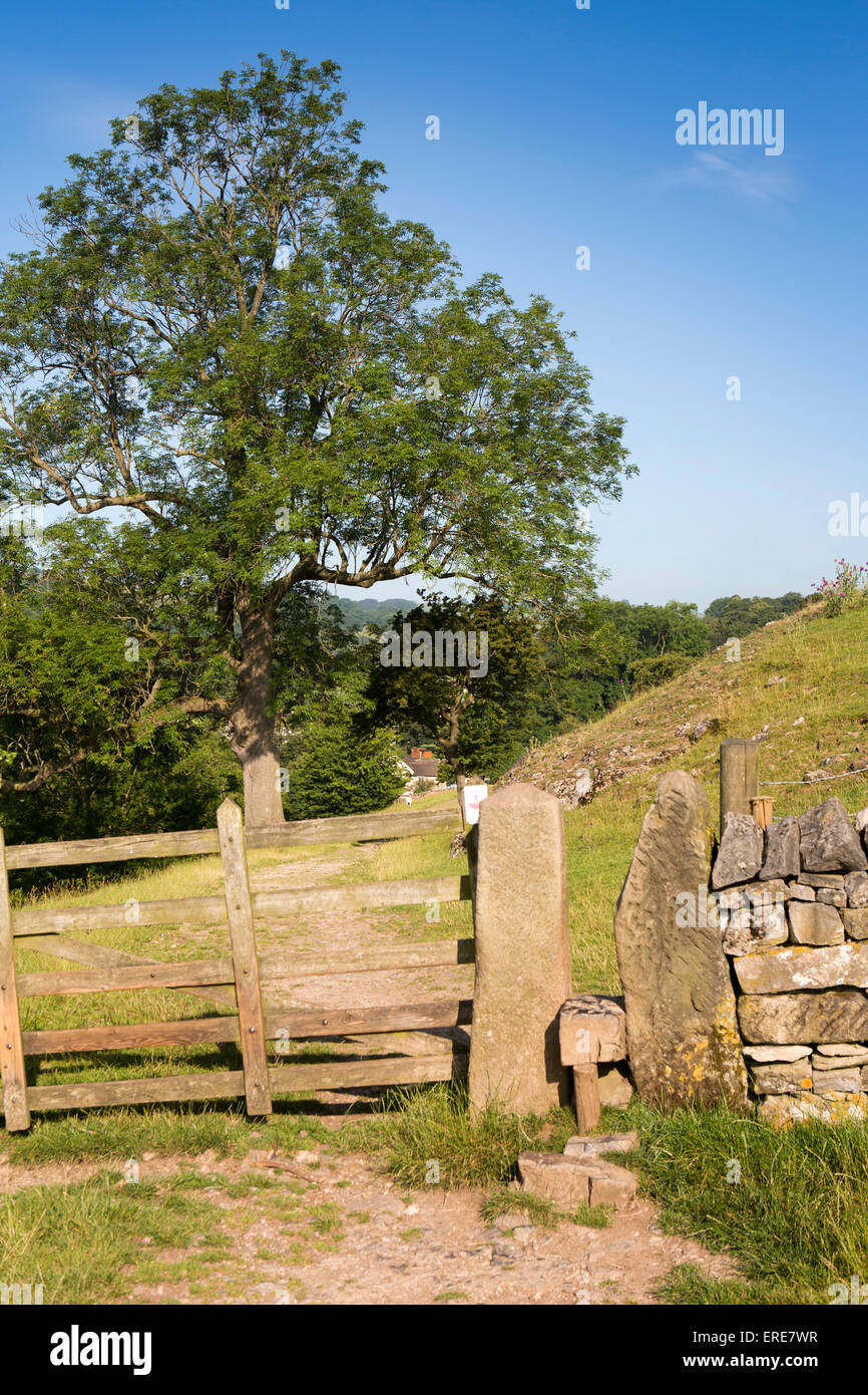 UK, England, Staffordshire, Ilam, narrow stone stile on path across fields below Bunster Hill to Dovedale Stock Photo