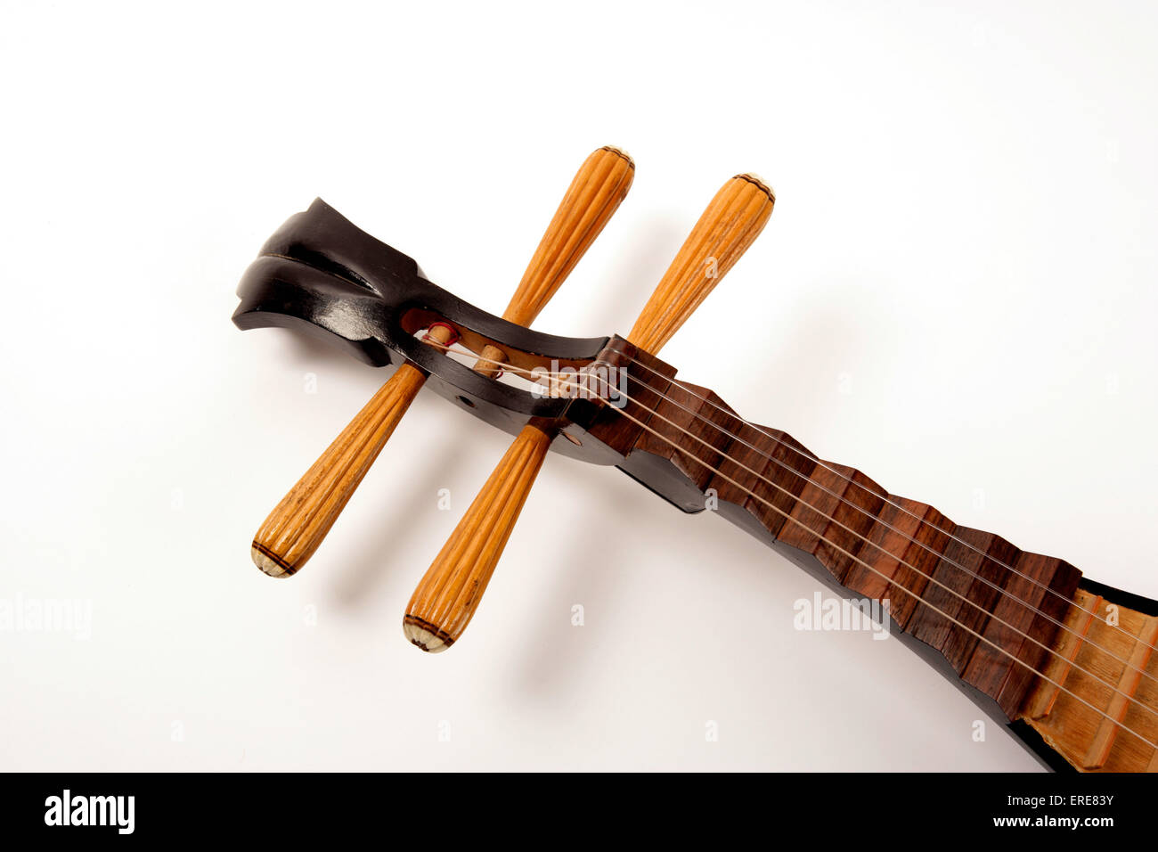 Chinese Pipa, close-up of the tuning pegs, or short-necked lute, tradtional  instrument of china made with shallow piriform body, wooden soundboard and  frets and four strings tuned to E, A, B, E