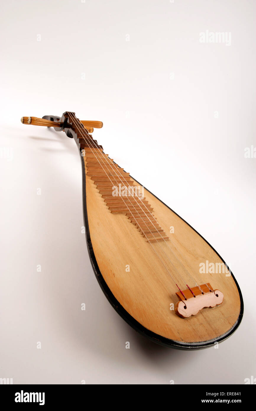 Chinese Pipa, or short-necked lute, tradtional instrument of china made with shallow piriform body, wooden soundboard and frets Stock Photo