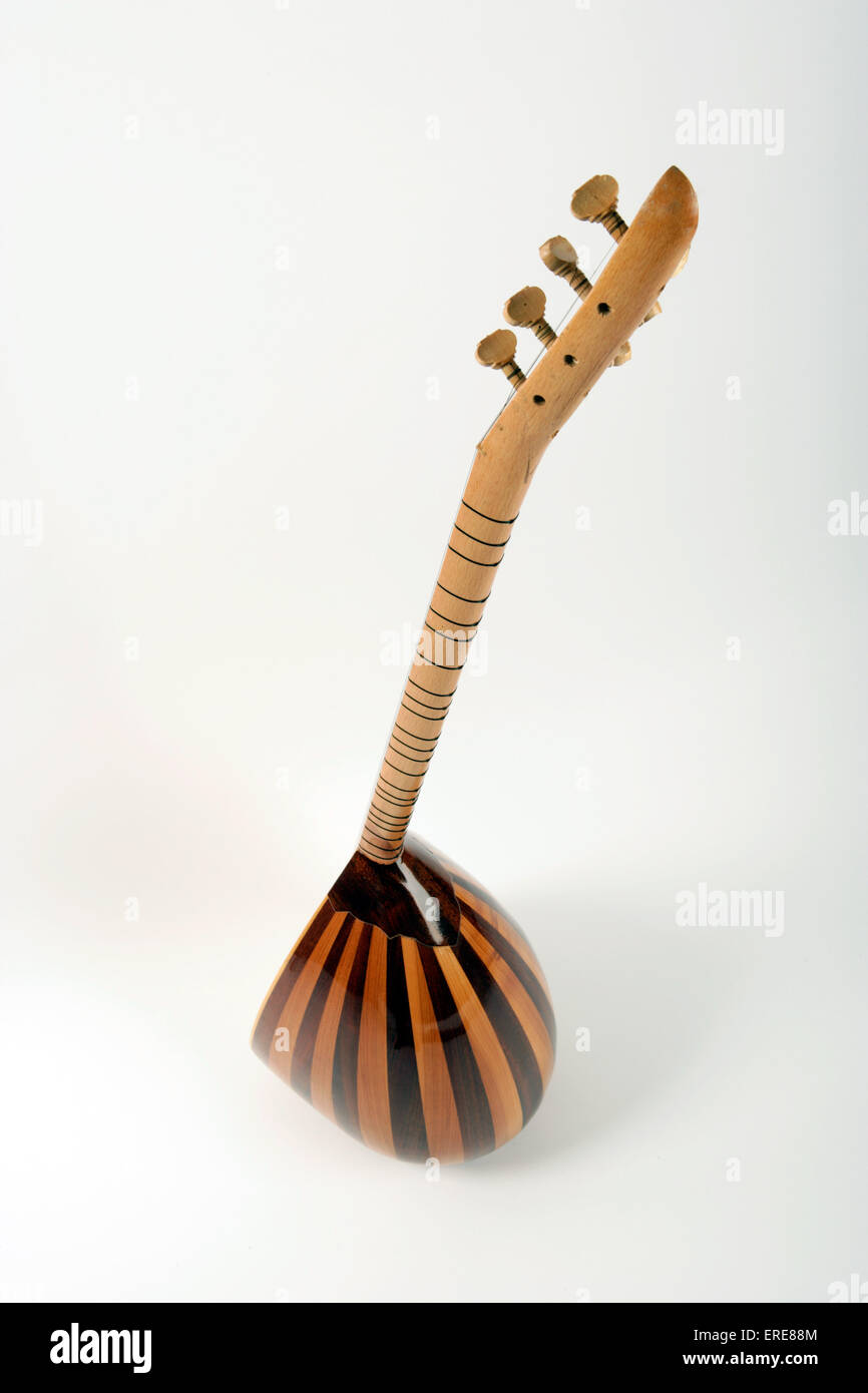 Long guitar sale like instrument