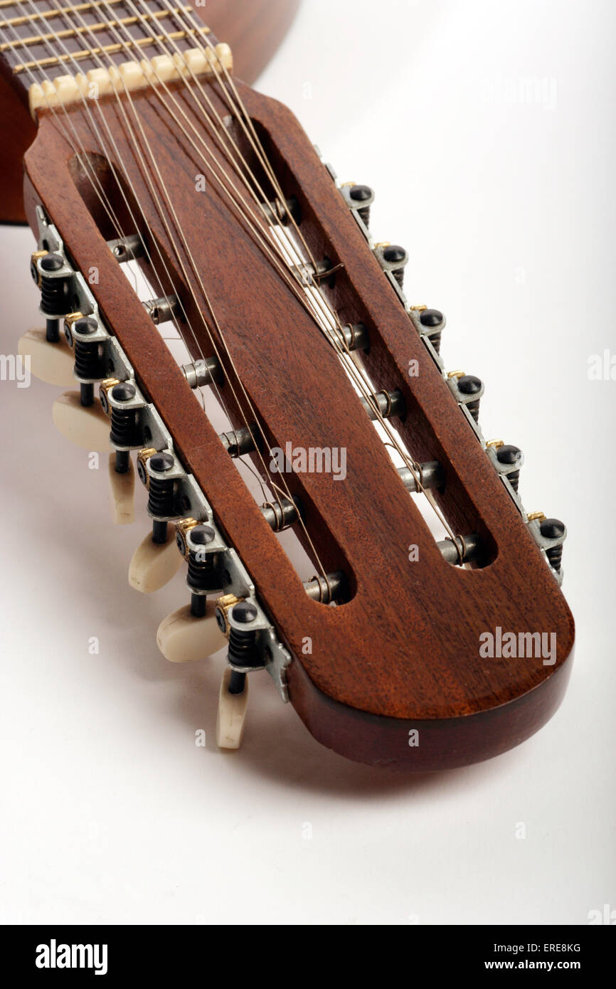 Close-up detail of a Bandurria or 12 string Spanish Mandolin showing the  head with the tuning pegs and strings Stock Photo - Alamy