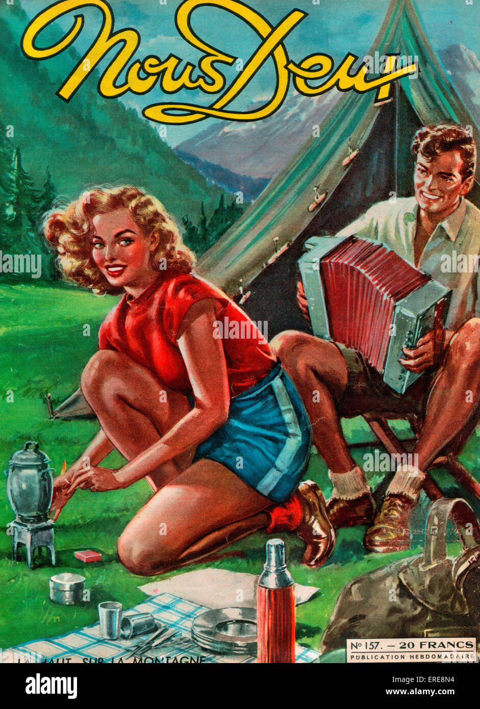 Cover of French romance magazine Nous Deux, 1948. Couple camping in mountains, the man playing the accordion. Stock Photo