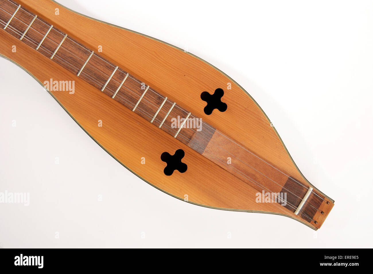 4 string Appalachian Dulcimer, also known as Mountain Dulcimer or mountain zither. Close up detail of strings and sound holes Stock Photo