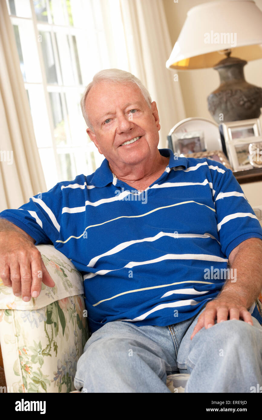 Retired man sitting looking camera hi-res stock photography and images ...