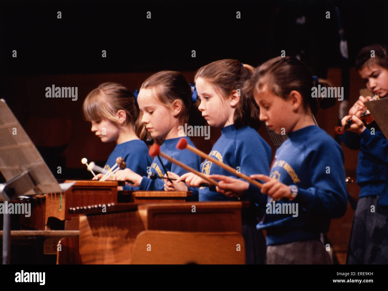 CHILDREN playing instruments Children's Orchestra.   Playing Xylophone Stock Photo