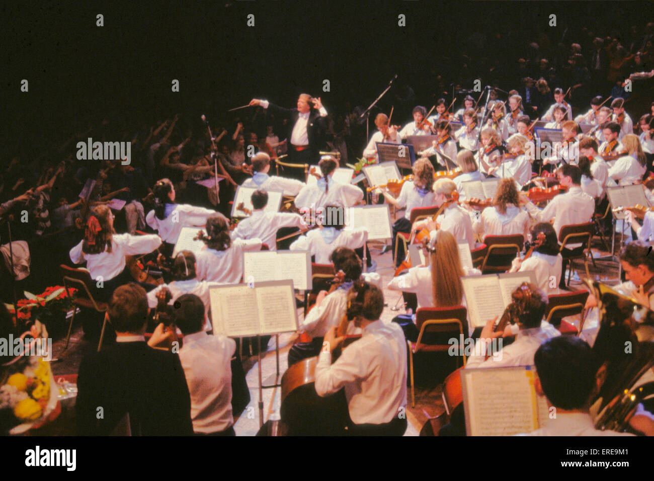 Youth orchestra in performance with conductor Antony Hopkins Stock Photo