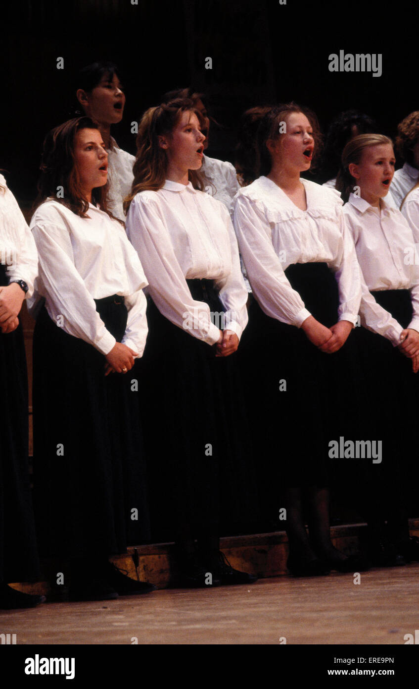Choir of school girls singing, wearing white shirts in London Stock Photo Alamy