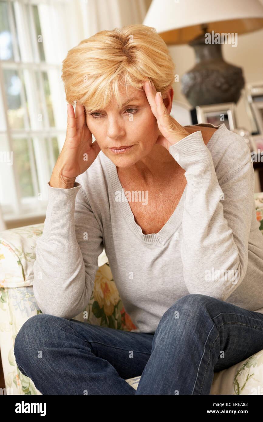 Mature woman home sofa hi-res stock photography and images - Alamy