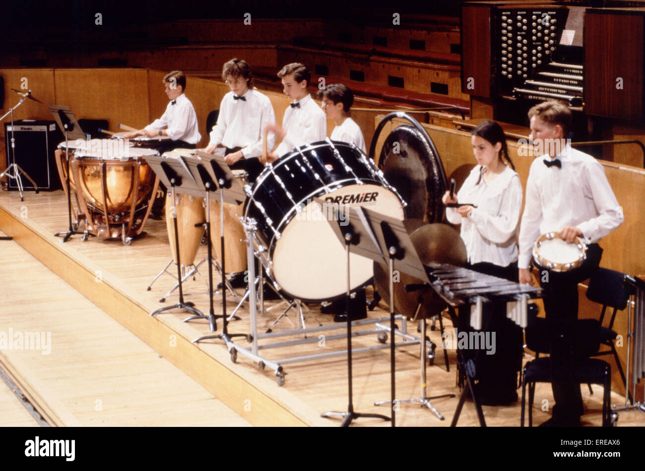 PERCUSSION SECTION. Children, teenagers, young adults, playing in percussion section of orchestra. Stock Photo