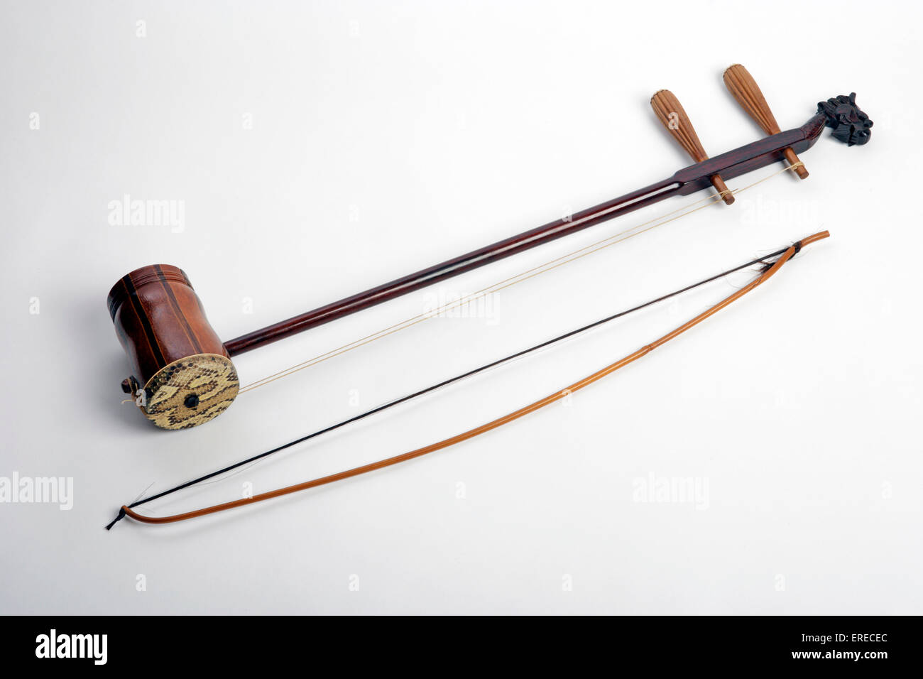 Erhu with its bow. Chinese 2 stringed instrument Stock Photo