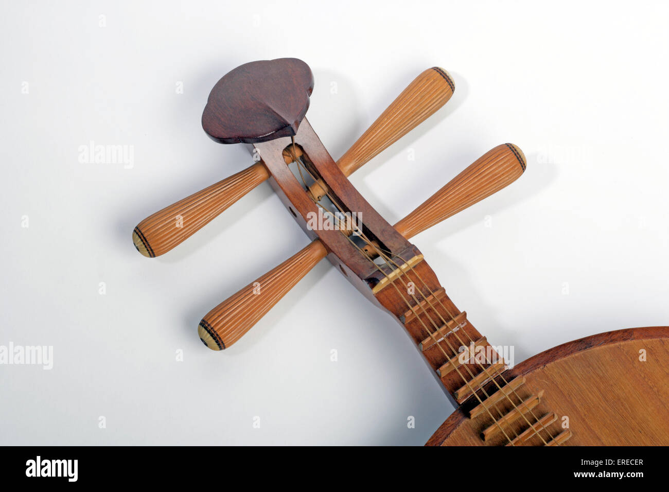 Chinese Moon shaped lute, or moon guitar. Yueh chin. Yueqin. Detail of  scroll strings and tuning pegs Stock Photo - Alamy