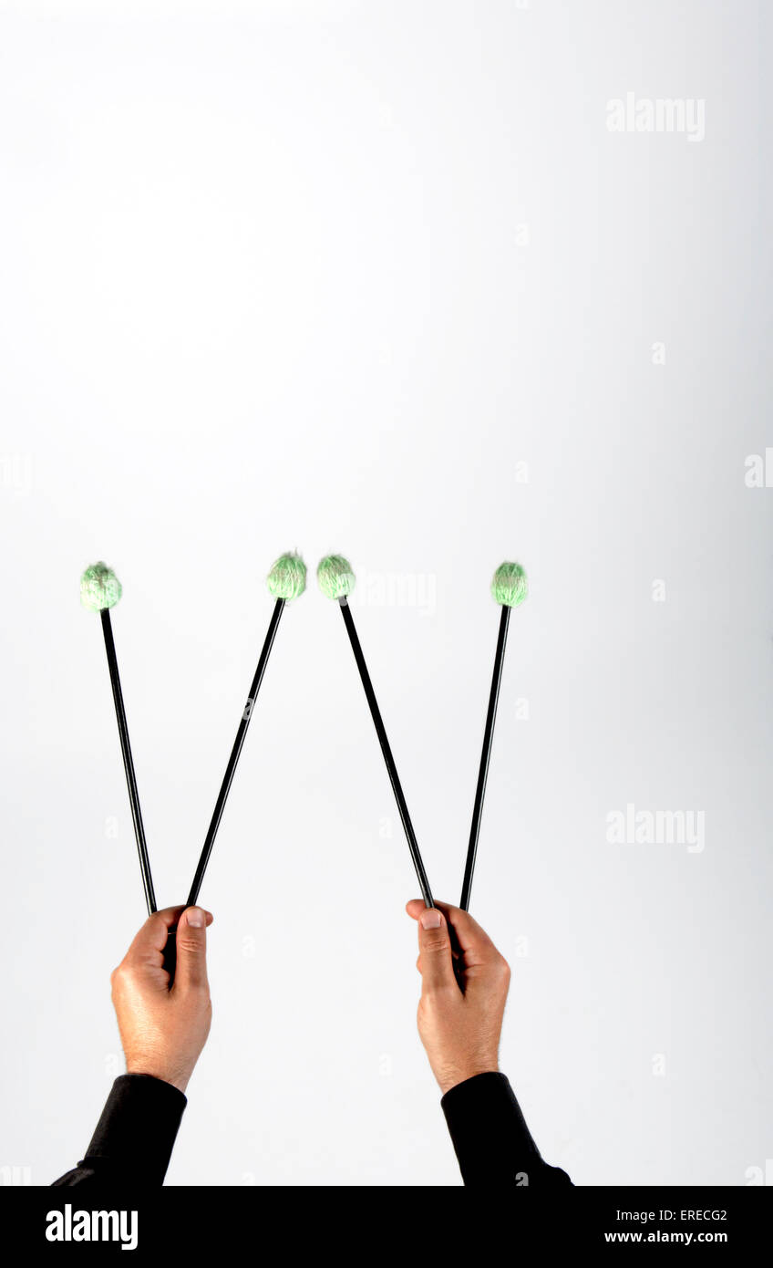 4 mallets, or four mallet playing. Marimba mallets with black birch handle Stock Photo Alamy
