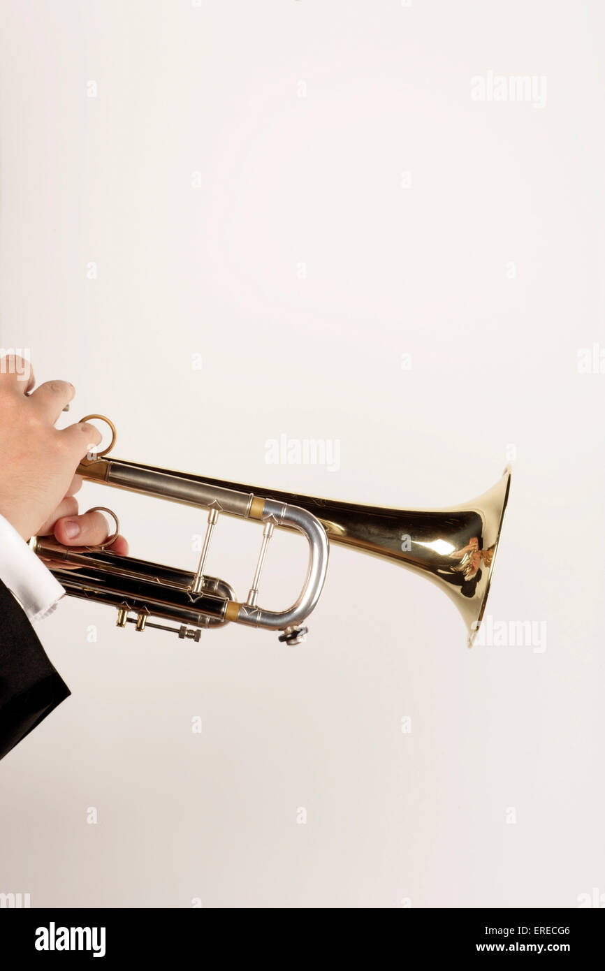 Trumpet being held in one hand, in playing position Stock Photo - Alamy