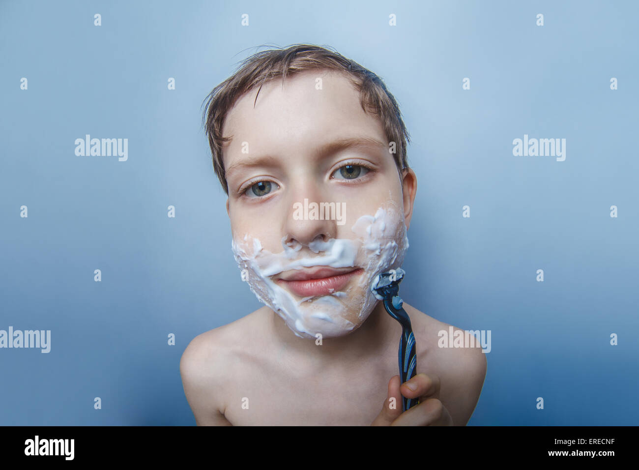 the boy of the European appearance decade person shaves, shaving Stock