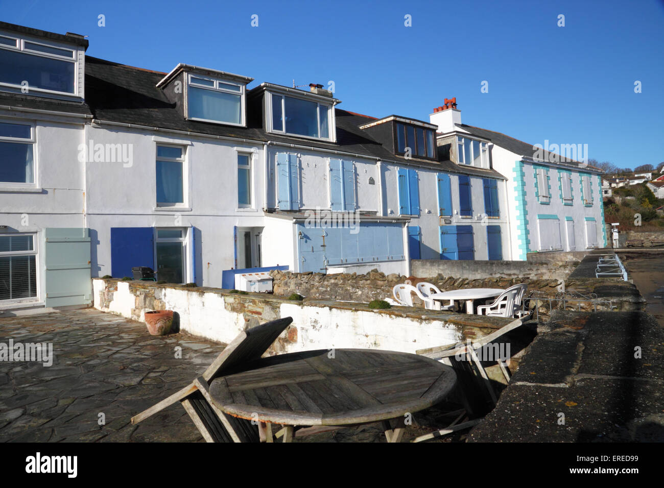 Shuttered terraced houses at Portmellon, Cornwall Stock Photo Alamy