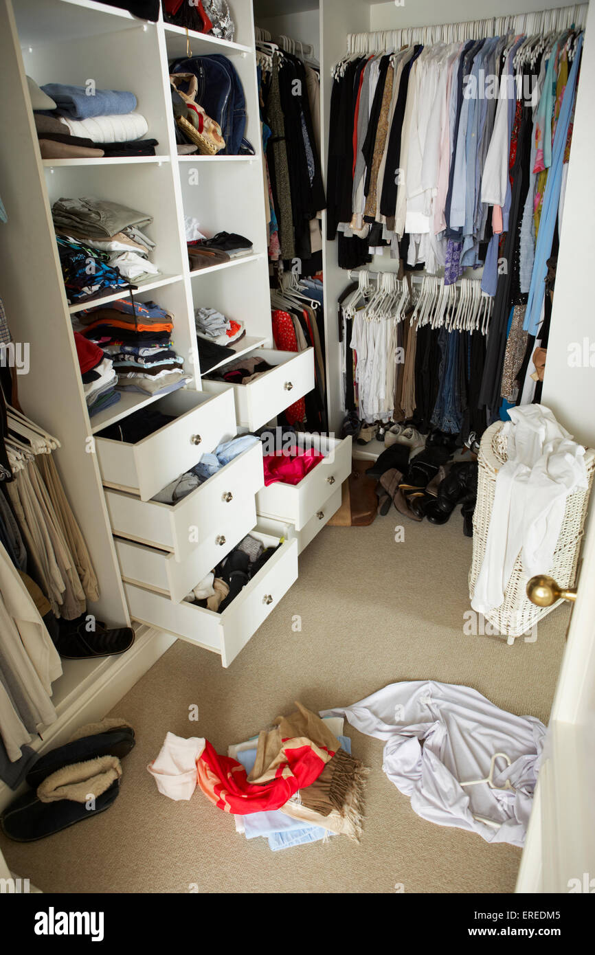 Untidy Teenage Bedroom With Messy Wardrobe Stock Photo