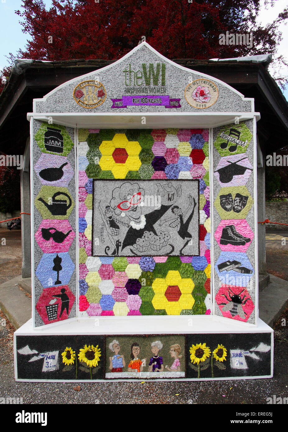 A well dressing commemorates the 100th anniversary of the founding of the Women's Institute, Peak District, Derbyshire UK 2015 Stock Photo