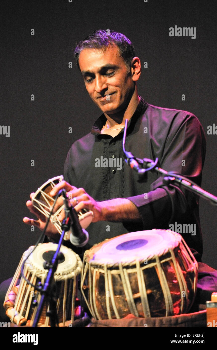 Kuljit playing various indian percussion hires stock photography and