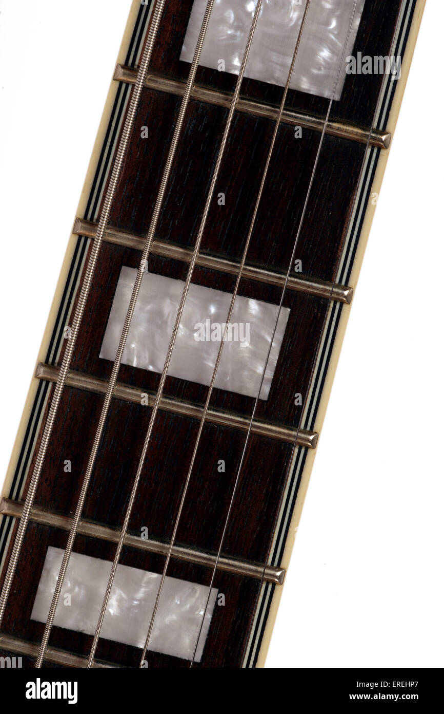 Guitar neck with mother of pearl inlay, generic, showing detail of strings  and fingerboard Stock Photo - Alamy