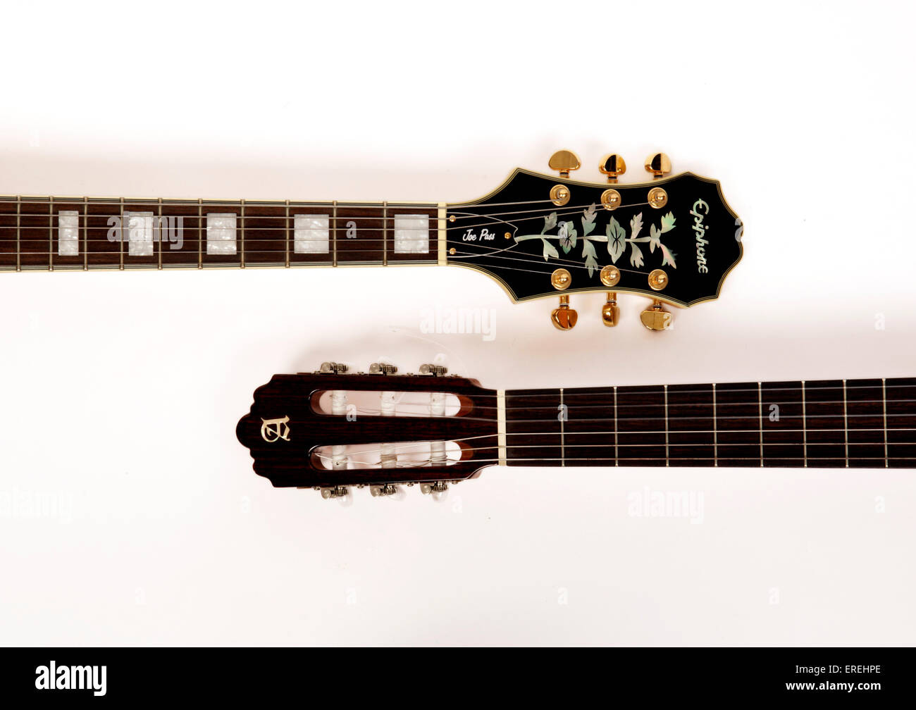 Necks and head of Semi Acoustic electric guitar by Epiphone and Acoustic  guitar by Alhambra of Spain Stock Photo - Alamy