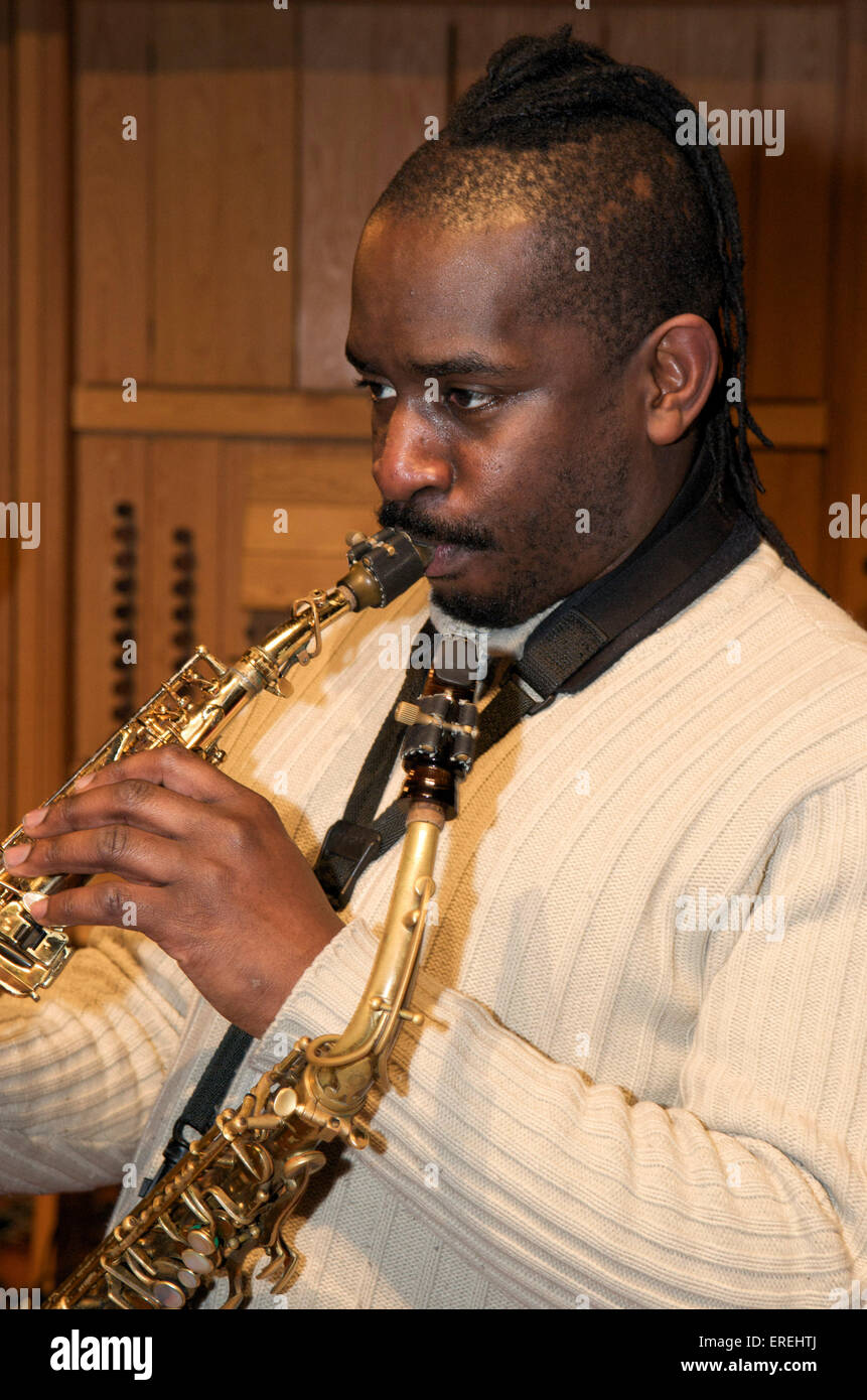 Jason Yarde playing soprano saxophone during sound checks with