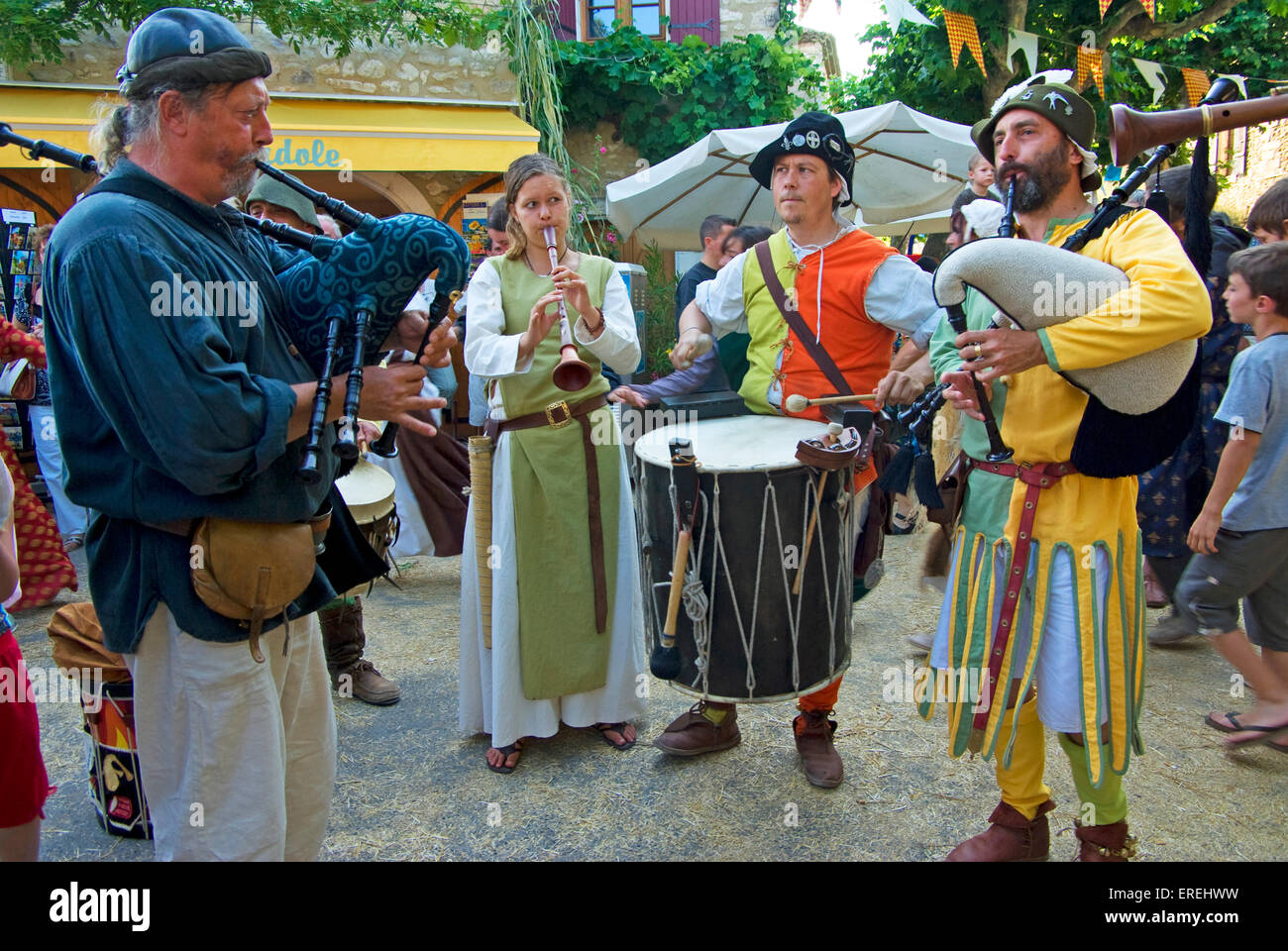 Musicians in medieval costumes, playing Galician bagpipes, shawm and tabor  in the medieval village of Aiguèze in the Ardèche Stock Photo - Alamy